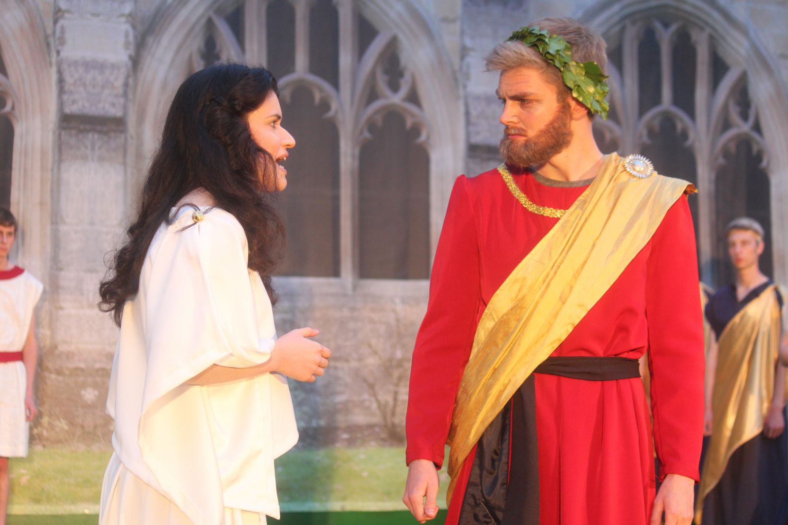 Sophocles Antigone, Oxford, New College Cloisters, 2016. Antigone confronts Creon. Tragic conflict in ancient costume.
