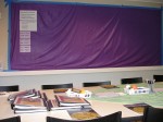 Focus group set-up (sticky wall; educator packets; brochures; writing utensils and materials)