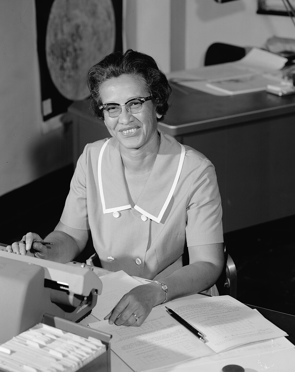 Katherine Johnson working at a desk at NASA in 1966.