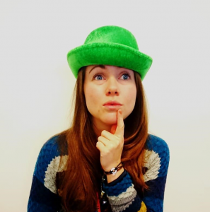 Penny wearing green hat