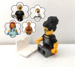 A LEGO minifigure thinks about different careers.