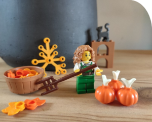 Lego figure with lego pumpkins