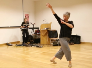 Susie and Malcolm performing 'Tisiphone' at a Classics Colloquium in Oxford in 2013.