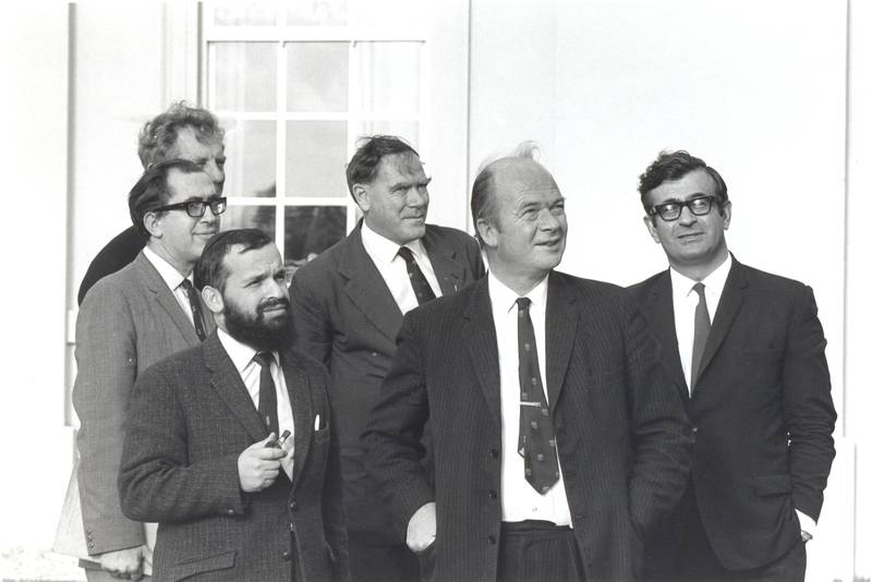 Pioneers of the OU: showing (from left to right) Mike Pentz, first Dean of Science; Geoffrey Holister, first Dean of Technology; Maxim Bruckheimer, first Dean of Mathematics; John Ferguson, first Dean of Arts; Walter Perry, first Vice-Chancellor; and Anastasias Christodoulou, first University Secretary.