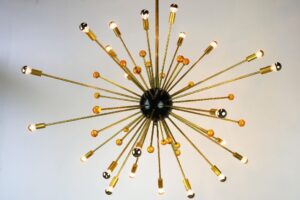 Orange and brass chandelier inspired by Sputnik