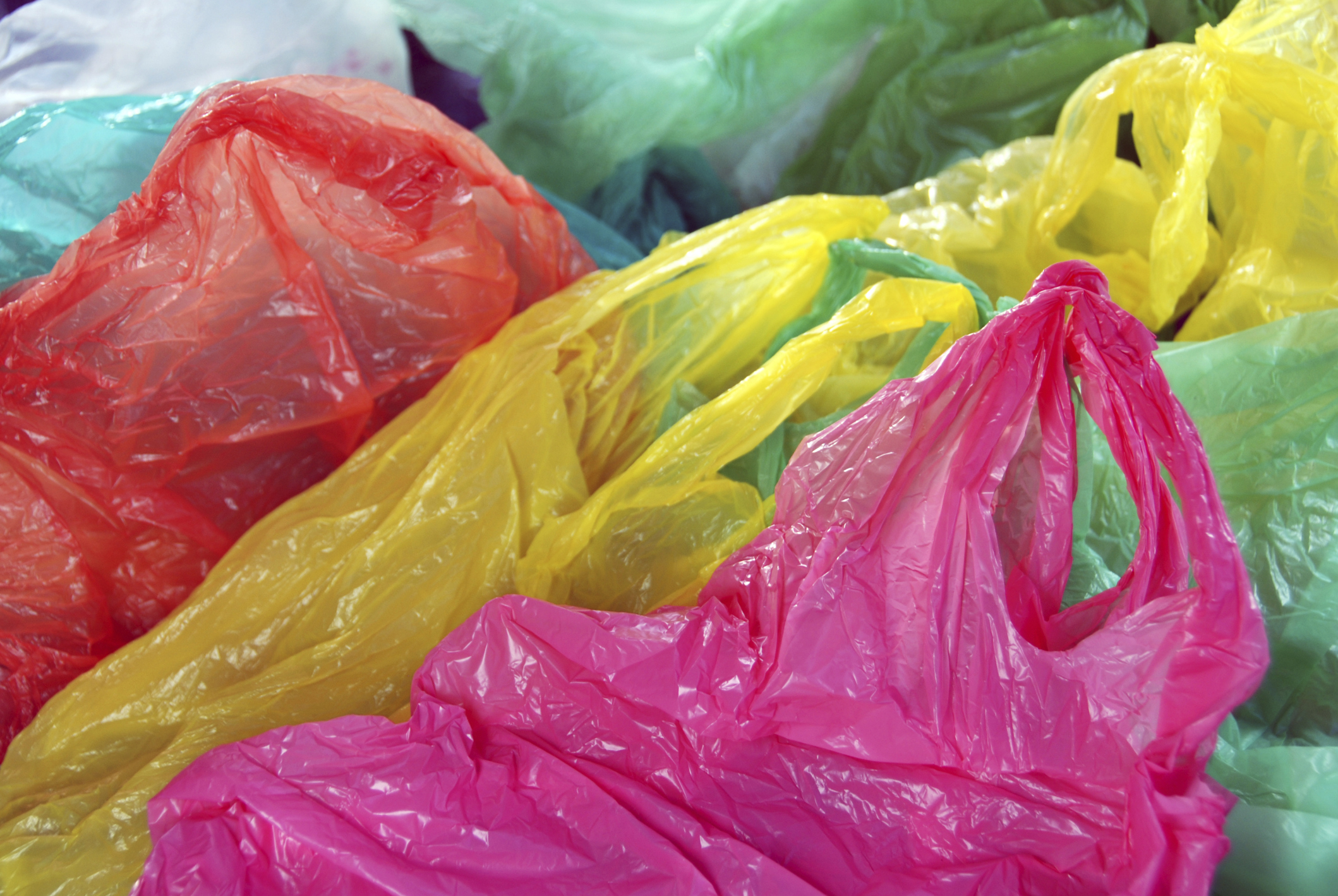 Coloured plastic carrier bags. Image credit: Thinkstock