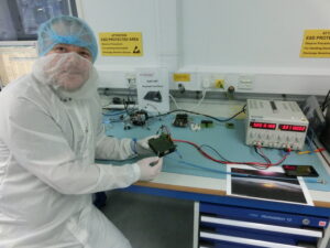 Dr Ross Burgon with the C3D2 payload during acceptance testing [Credit: Courtesy of SSC]