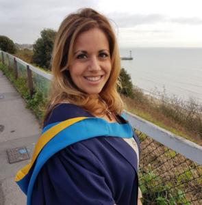 Graduate by the sea