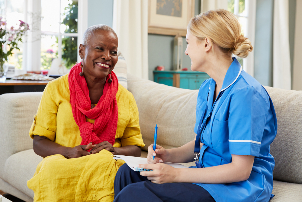 nurse in community setting with patient
