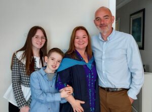 Sharlene celebrates her OU degree with her family