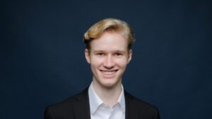 Young graduate Bryan completed his OU Business degree aged 18