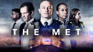 Image shows four Metropolitan Police Officers with the words 'The Met' written across the middle of the image