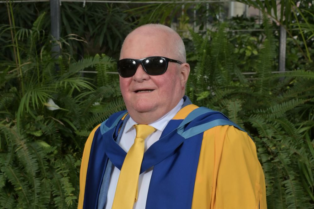 Disability campaigner honoured for his work in education