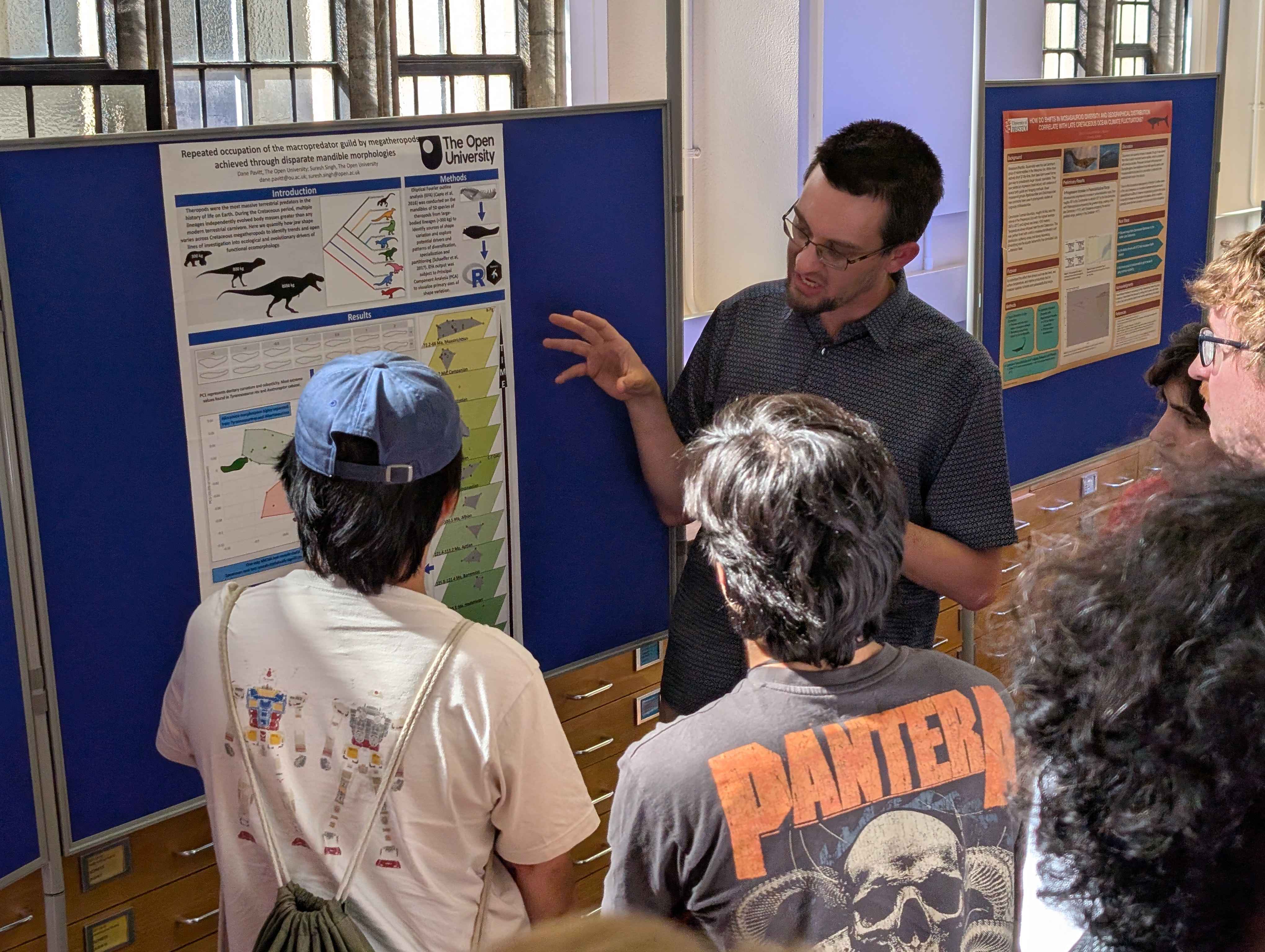 Open University Natural Sciences student Dane presents his research to other students