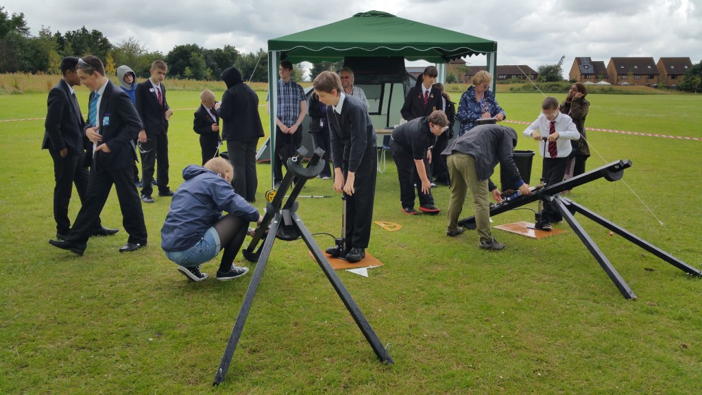 Vic Pearson (The Open University) and Leanne Gunn (Science Made Simple) assist the students with the launchers.