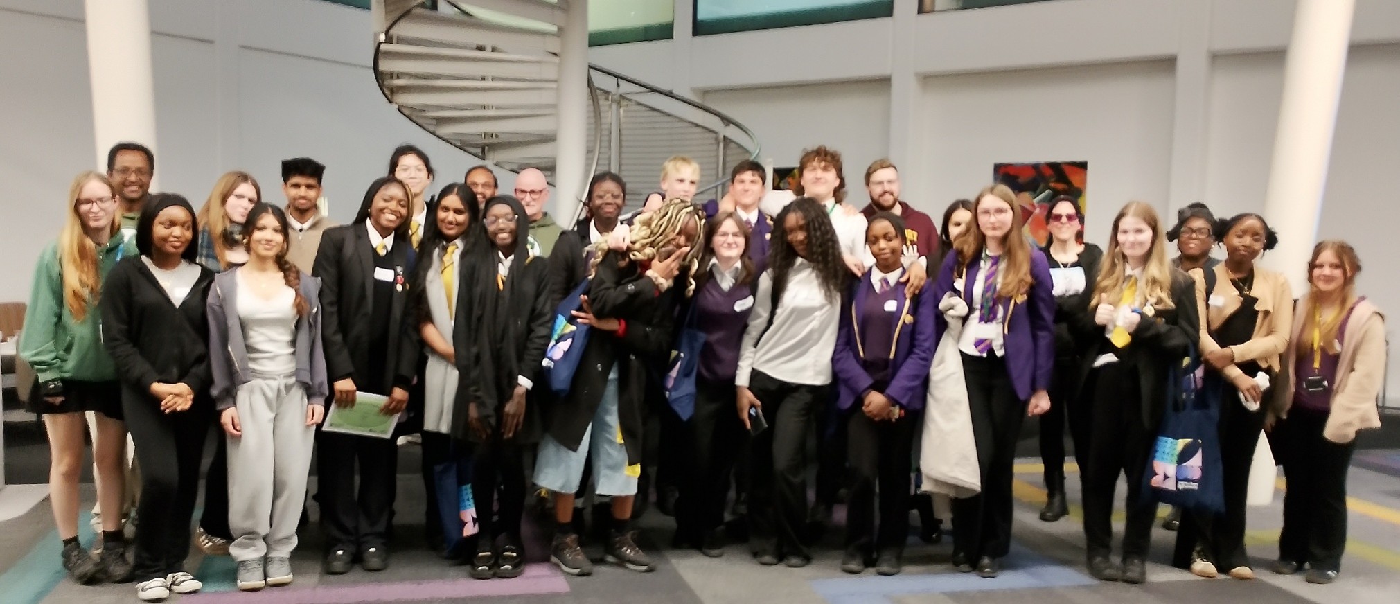 This is a group photo, celebrating BEYOND with some of the young people and members of the project team.