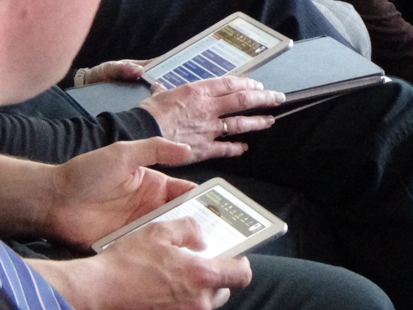 People holding tablets