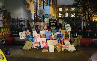 Protest signs litter the streets in London