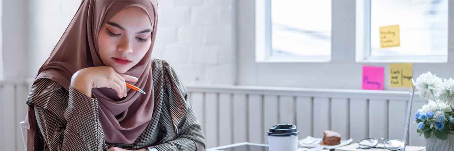 Beautiful Arabic woman studies