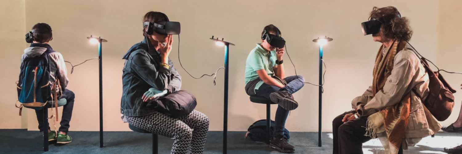 Group of people wearing augmented reality headsets