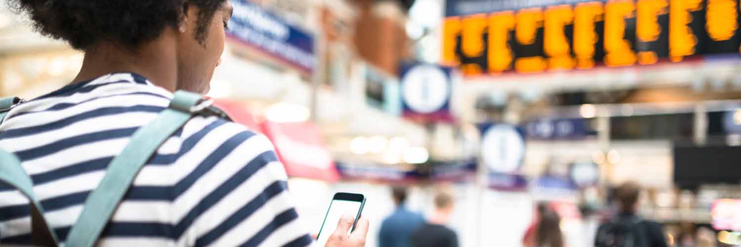 Man using his smartphone to translate