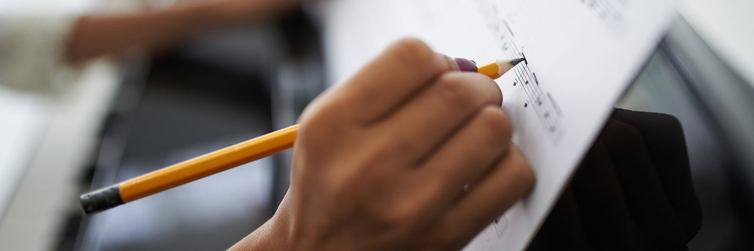 Person making musical notation