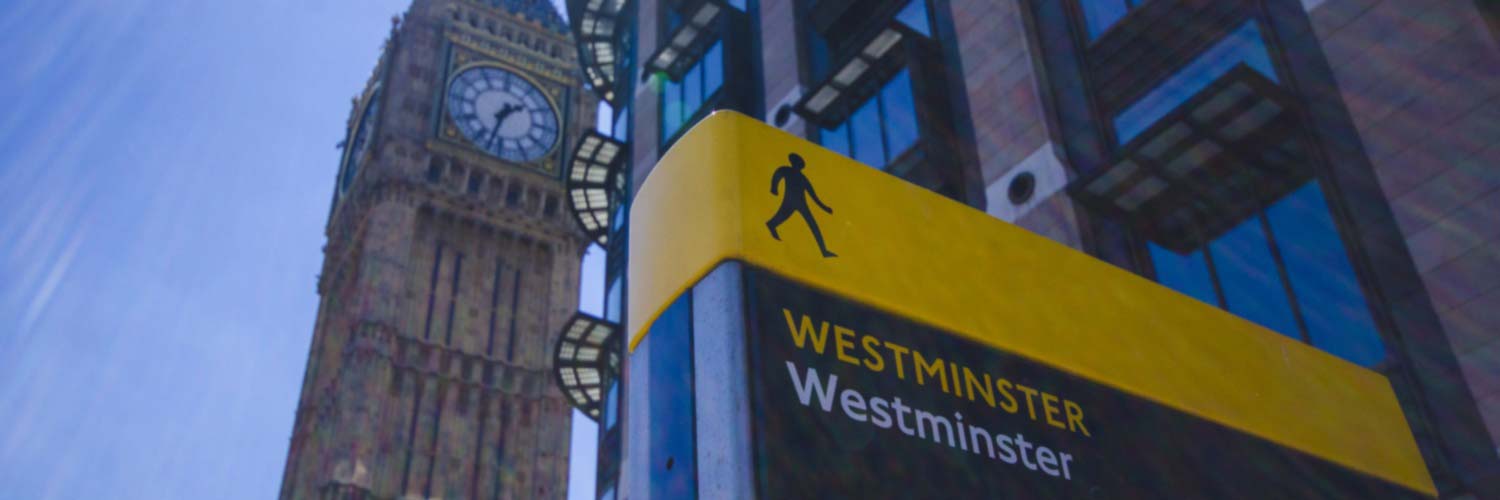 Big Ben and Westminster street sign in London