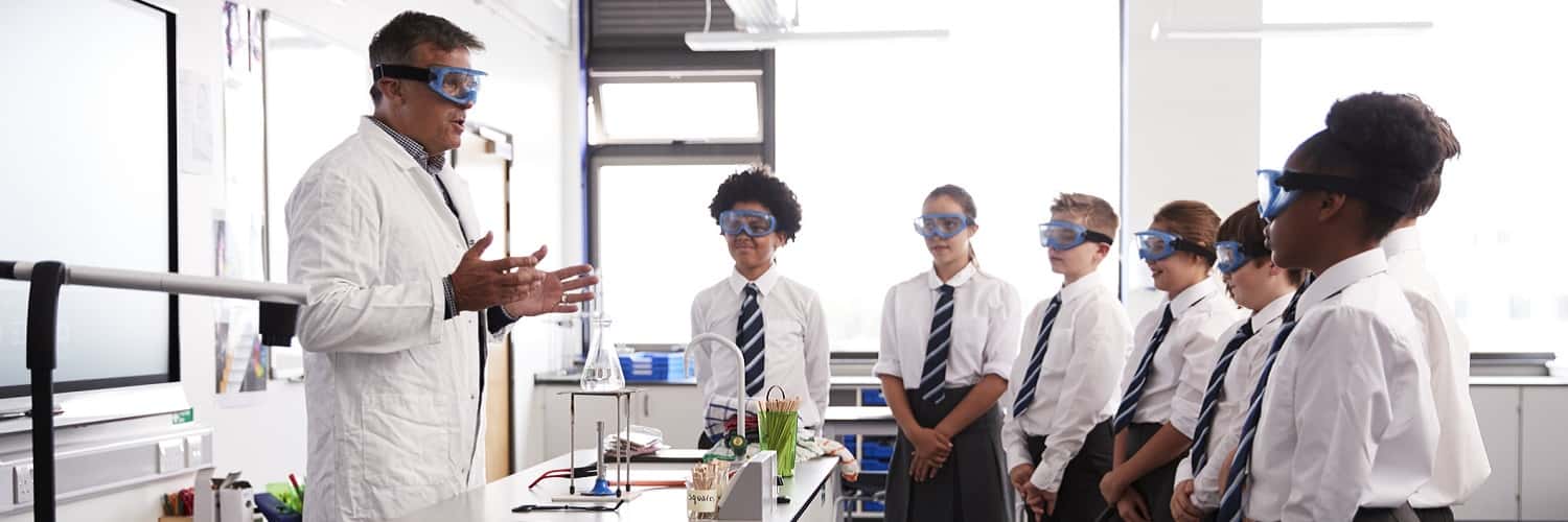 A science teacher in a classroom
