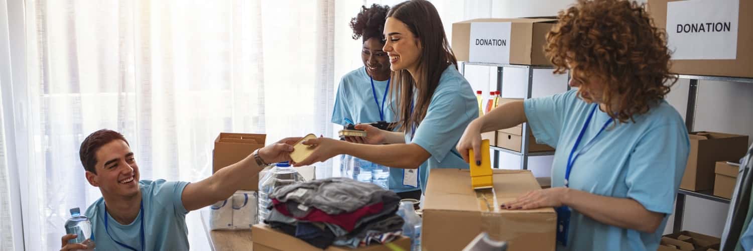 Charity workers collating donations