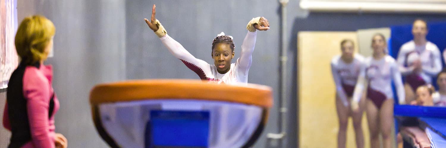 Instructor teaching gymnastics