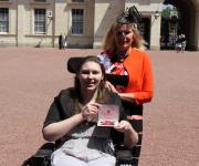Lucy collecting her MBE