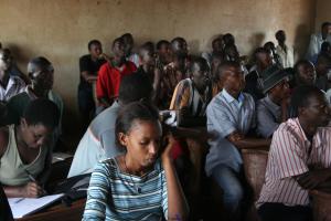 Image of a group of adults learning in a classroom in Burundi, taken January 2009 