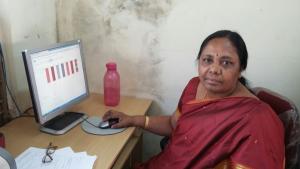Senior Lecturer of DIET Bangalore Rural, Karnataka, using a computer to undertake the MOOC