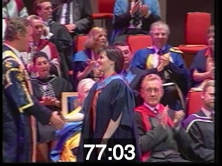 clicking on this image will launch a new video player window playing at this point (ie 77 minutes and 3 seconds) from the start of the video