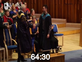clicking on this image will launch a new video player window playing at this point (ie 64 minutes and 30 seconds) from the start of the video