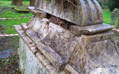 A close-up shot of the discovered tomb after the ivy had been removed.
