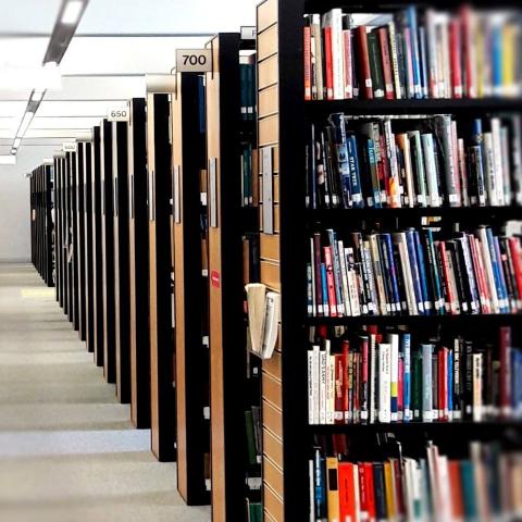 Shelves of books at the Open University Library building in Milton Keynes.