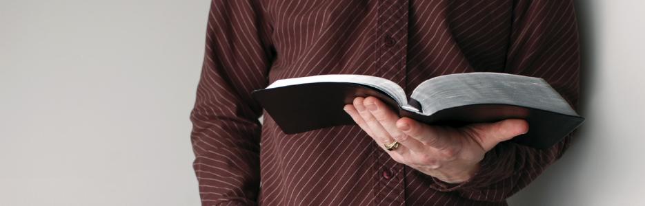 A man holding the bible