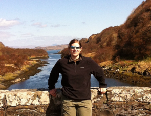 Freya standing on a bridge in the sunshine