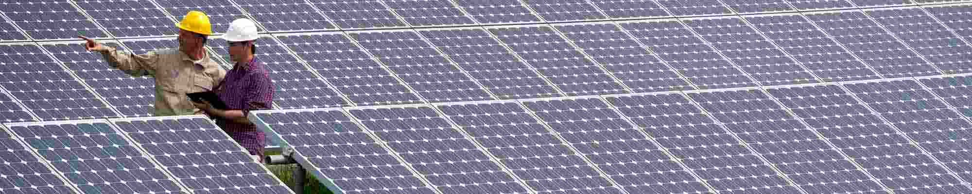 Technicians at solar power station