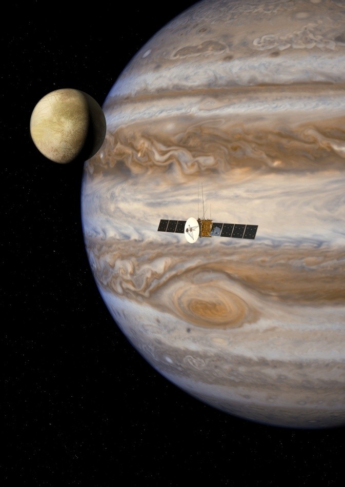 Artists impression of the JUICE Spacecraft orbiting Jupiter, Image Credit: ESA/AOES