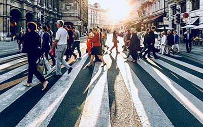 Pedestrians crossing a road - image by Jacek Dylag on Unsplash