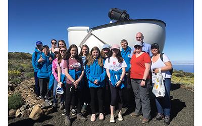 Denny High School pupils at the OU's telescope on Tenerife with the OU's Dr Alan Cayless