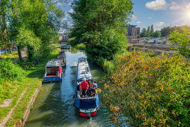 UK Bedford old river channel boats sailing upstream