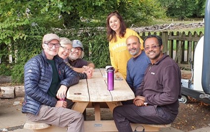Members of the Landscape Stories team, having lunch. On the right, Richard Holliman, Clare Warren and Marcus Badger. On the right, Yoseph Araya, Subash Ludhra and Geeta Ludhra.